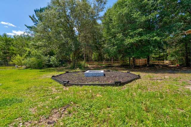 4236 Edge Perry Rd, Crestview, FL 32539 - view of yard with a fire pit