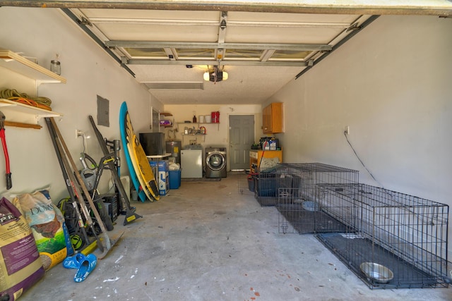 4236 Edge Perry Rd, Crestview, FL 32539 - garage featuring a garage door opener, independent washer and dryer, and electric panel