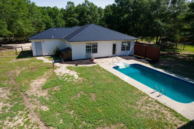 4236 Edge Perry Rd, Crestview, FL 32539 - rear view of property with metal roof and a patio