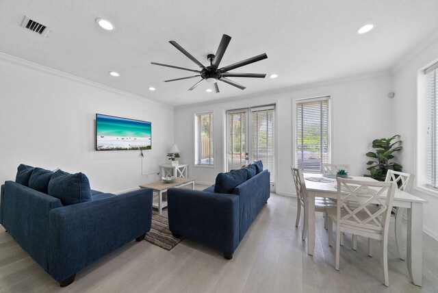 142 Southfields Rd, Panama City Beach, FL 32413 - living room with ornamental molding, light wood finished floors, recessed lighting, a ceiling fan, and baseboards