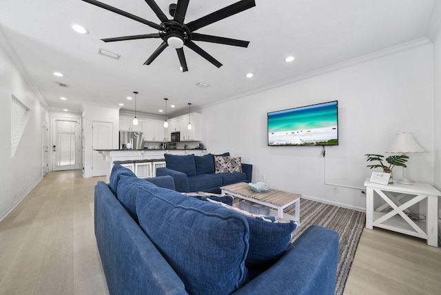 142 Southfields Rd, Panama City Beach, FL 32413 - living room with ornamental molding, recessed lighting, a ceiling fan, light wood finished floors, and baseboards