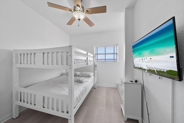 142 Southfields Rd, Panama City Beach, FL 32413 - bedroom with wood finished floors, baseboards, and ceiling fan