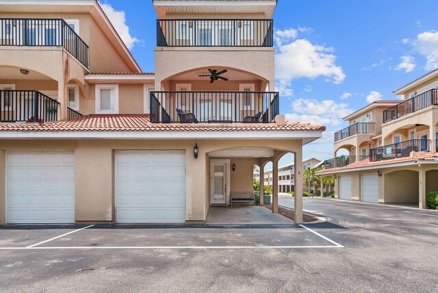 142 Southfields Rd, Panama City Beach, FL 32413 - view of property with a garage
