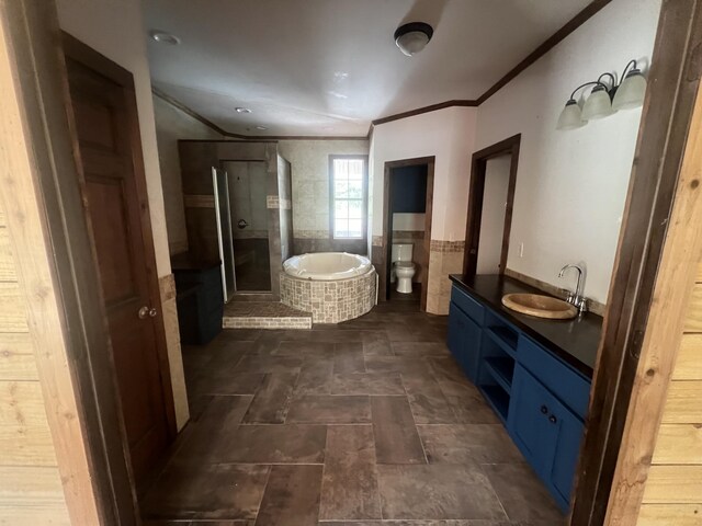 4932 Joiner Cir, Milton, FL 32583 - full bathroom with ornamental molding, vanity, a shower stall, a garden tub, and stone finish flooring