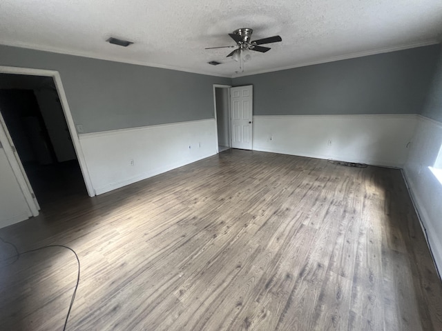 4932 Joiner Cir, Milton, FL 32583 - spare room with ceiling fan, a textured ceiling, wood finished floors, and crown molding