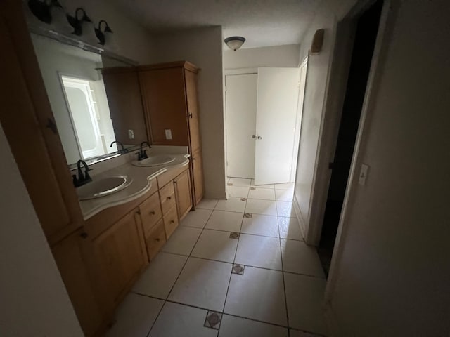 4932 Joiner Cir, Milton, FL 32583 - bathroom with double vanity and tile patterned floors