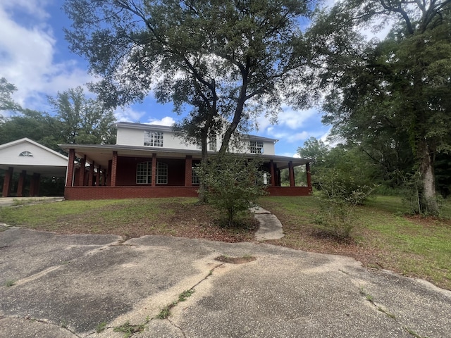 4932 Joiner Cir, Milton, FL 32583 - view of front of property with covered porch and brick siding