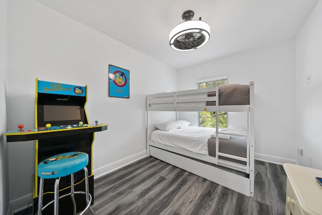512 Dement Cir Apt F, Panama City Beach, FL 32407 - bedroom with wood finished floors and baseboards