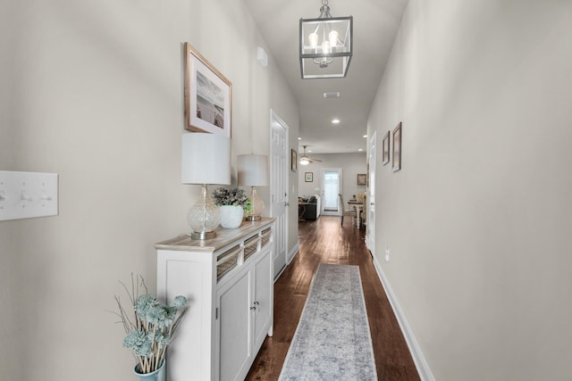2065 Wilsons Plover Cir, Navarre, FL 32566 - hall with dark wood-style flooring, a chandelier, baseboards, and recessed lighting