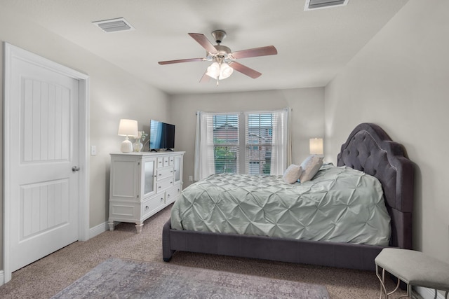 2065 Wilsons Plover Cir, Navarre, FL 32566 - carpeted bedroom featuring ceiling fan and baseboards