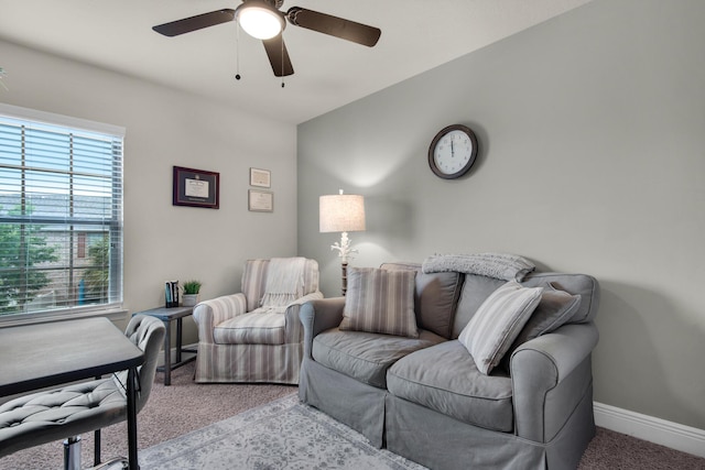 2065 Wilsons Plover Cir, Navarre, FL 32566 - carpeted living area featuring healthy amount of natural light, a ceiling fan, and baseboards