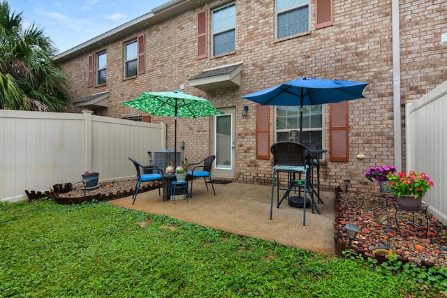 2065 Wilsons Plover Cir, Navarre, FL 32566 - view of patio / terrace with central air condition unit