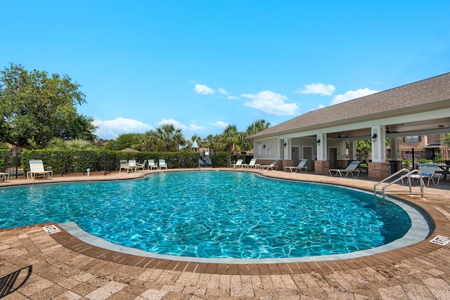 2065 Wilsons Plover Cir, Navarre, FL 32566 - community pool with a patio and ceiling fan
