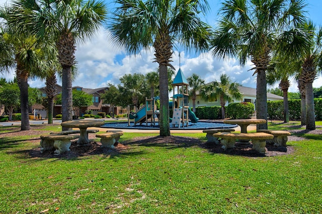 2065 Wilsons Plover Cir, Navarre, FL 32566 - community jungle gym with a lawn
