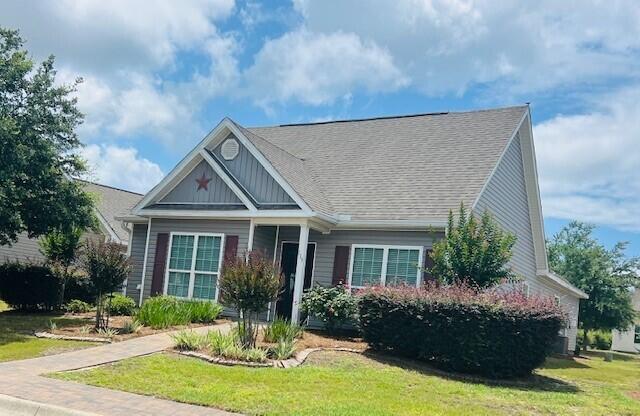 115 Lilly Bell Ln, Freeport, FL 32439 - view of front facade featuring a front yard