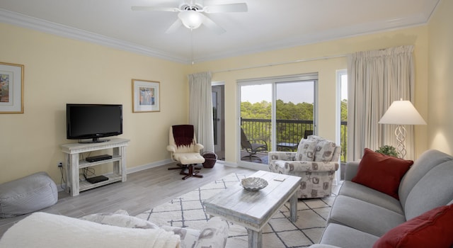 515 Topsl Beach Blvd # 401, Miramar Beach, FL 32550 - living room with crown molding, light wood-type flooring, baseboards, and ceiling fan