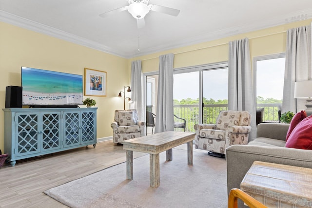 515 Topsl Beach Blvd # 401, Miramar Beach, FL 32550 - living area with crown molding, a ceiling fan, and wood finished floors