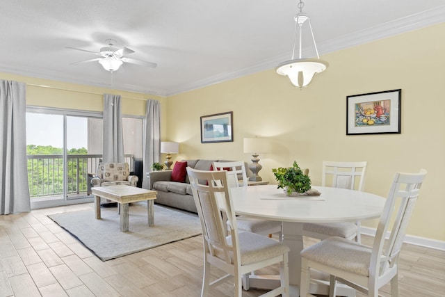 515 Topsl Beach Blvd # 401, Miramar Beach, FL 32550 - dining area with a ceiling fan, crown molding, light wood finished floors, and baseboards