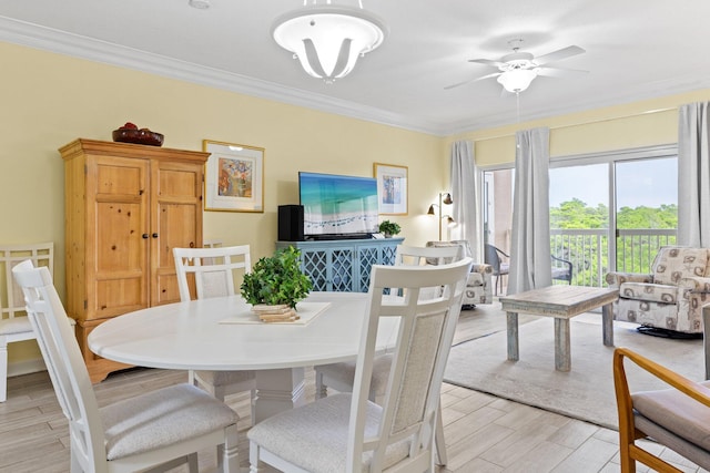 515 Topsl Beach Blvd # 401, Miramar Beach, FL 32550 - dining area featuring ornamental molding, light wood-type flooring, and a ceiling fan