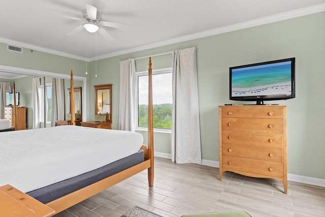 515 Topsl Beach Blvd # 401, Miramar Beach, FL 32550 - bedroom featuring baseboards, ornamental molding, wood tiled floors, and a ceiling fan