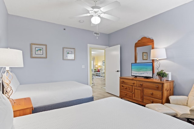 515 Topsl Beach Blvd # 401, Miramar Beach, FL 32550 - bedroom with light wood-style flooring and a ceiling fan