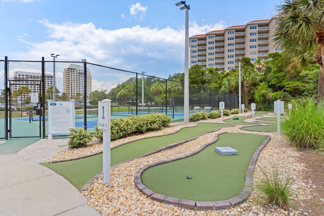 515 Topsl Beach Blvd # 401, Miramar Beach, FL 32550 - surrounding community with an area to practice putting and a tennis court