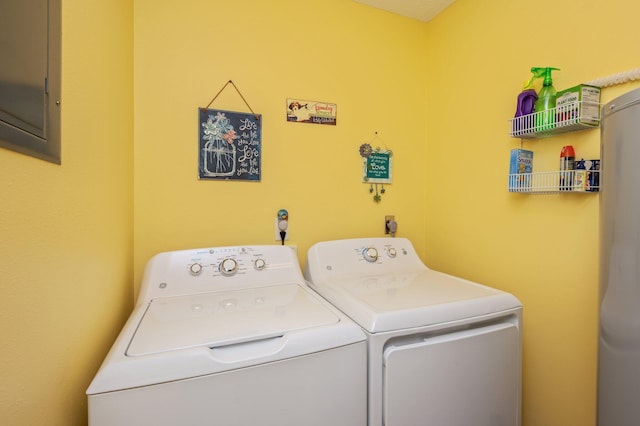 6256 Misty Ln, Crestview, FL 32539 - washroom with washer and clothes dryer and water heater