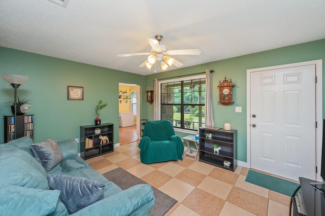 6256 Misty Ln, Crestview, FL 32539 - living room featuring a ceiling fan and baseboards