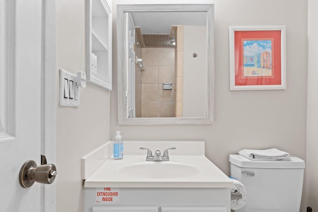 23223 Front Beach Rd # 913, Panama City Beach, FL 32413 - bathroom with toilet, vanity, and a tile shower