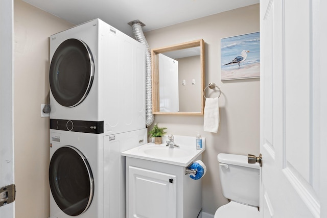 23223 Front Beach Rd # 913, Panama City Beach, FL 32413 - laundry room with stacked washer / dryer