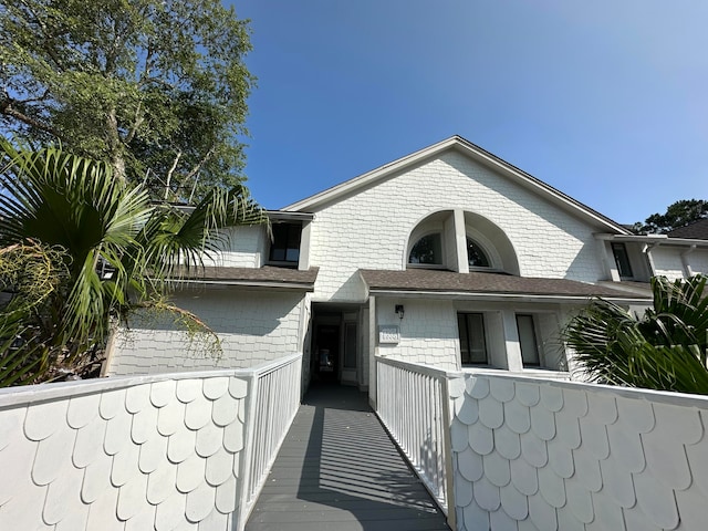 8966 Heron Walk Dr # 8966, Miramar Beach, FL 32550 - view of side of property with brick siding
