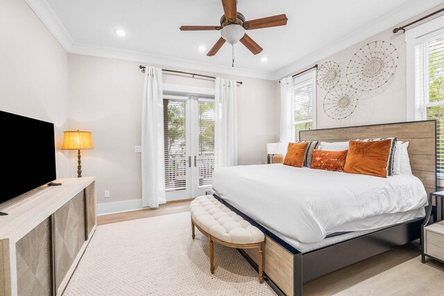 310 Morgans Trl, Santa Rosa Beach, FL 32459 - bedroom featuring access to exterior, crown molding, multiple windows, light wood-style floors, and recessed lighting