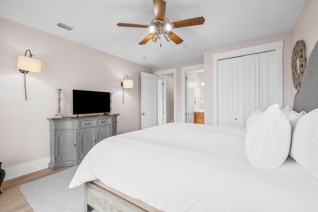 310 Morgans Trl, Santa Rosa Beach, FL 32459 - bedroom with light wood finished floors, baseboards, and ceiling fan