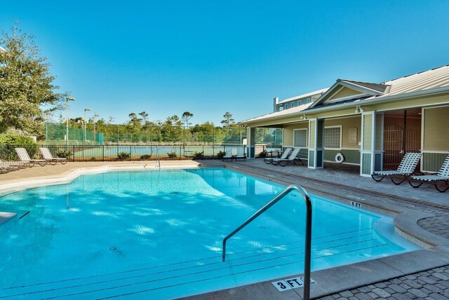 310 Morgans Trl, Santa Rosa Beach, FL 32459 - community pool with a patio