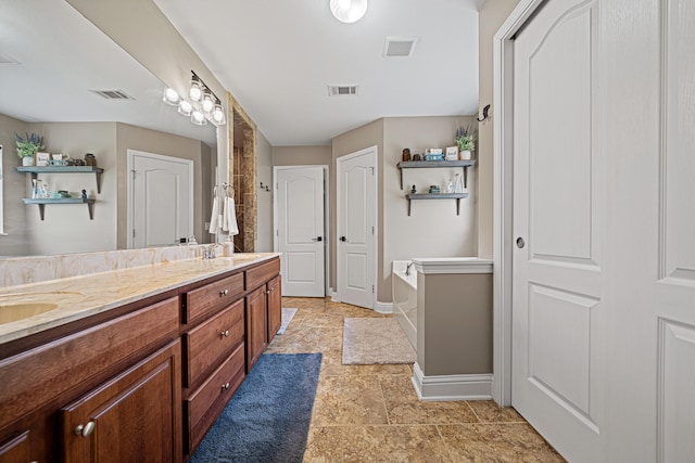 5416 Mill Brook Ln, Crestview, FL 32539 - full bathroom featuring double vanity, a bath, baseboards, and a closet