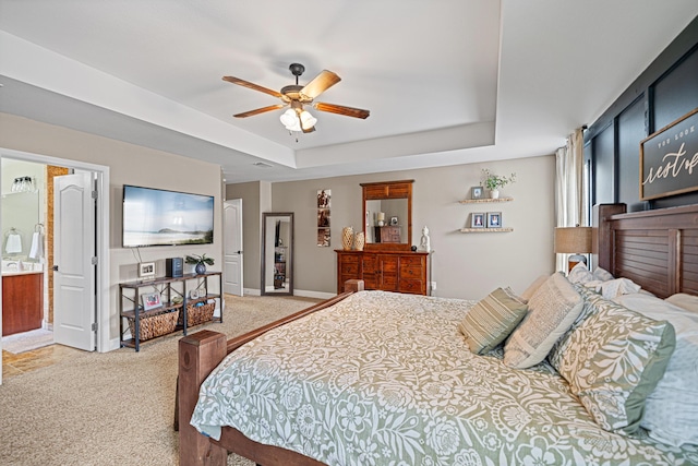 5416 Mill Brook Ln, Crestview, FL 32539 - bedroom with light carpet, a raised ceiling, baseboards, and ceiling fan