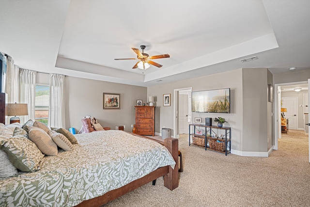5416 Mill Brook Ln, Crestview, FL 32539 - bedroom with a raised ceiling, light colored carpet, baseboards, and a ceiling fan