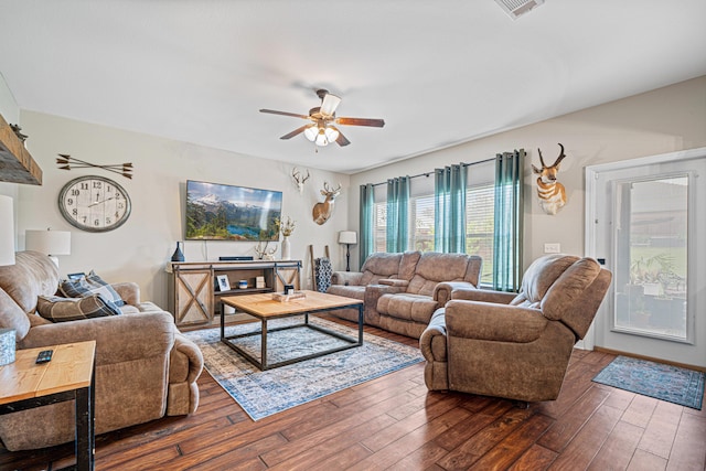 5416 Mill Brook Ln, Crestview, FL 32539 - living area with a ceiling fan and dark wood-style flooring