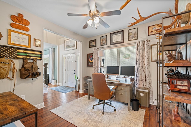 5416 Mill Brook Ln, Crestview, FL 32539 - home office featuring wood-type flooring, baseboards, and a ceiling fan