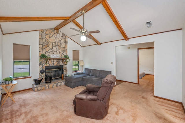 5951 N Meadow Ln, Crestview, FL 32539 - living area with carpet, baseboards, a ceiling fan, and a stone fireplace