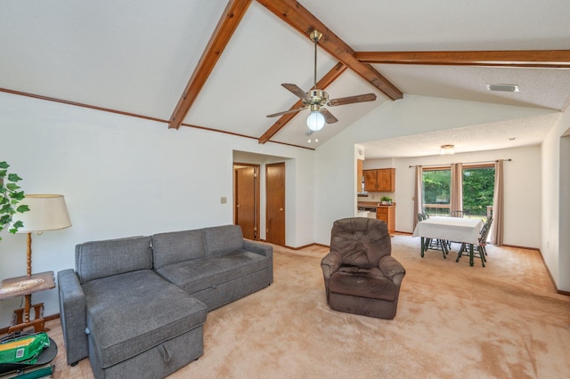 5951 N Meadow Ln, Crestview, FL 32539 - living room featuring light carpet, ceiling fan, beamed ceiling, high vaulted ceiling, and baseboards