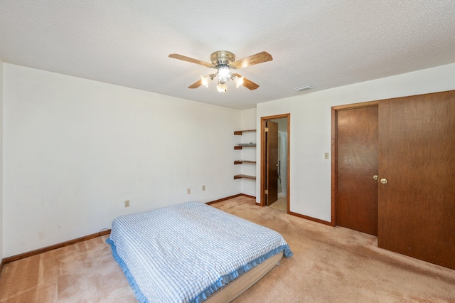5951 N Meadow Ln, Crestview, FL 32539 - bedroom with light carpet, baseboards, and a closet