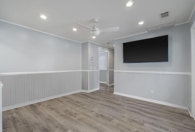 14 Winfield Way, Mary Esther, FL 32569 - empty room with crown molding, wood finished floors, a ceiling fan, baseboards, and recessed lighting
