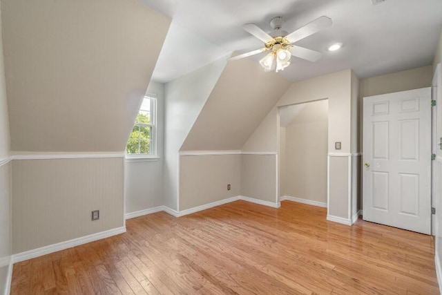 14 Winfield Way, Mary Esther, FL 32569 - additional living space with light wood-style floors, vaulted ceiling, baseboards, and a ceiling fan