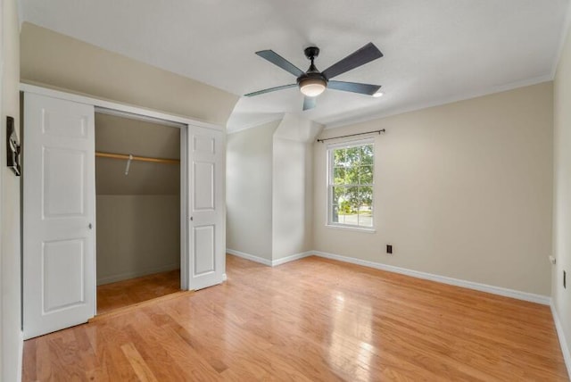 14 Winfield Way, Mary Esther, FL 32569 - unfurnished bedroom with light wood finished floors, a closet, baseboards, and a ceiling fan