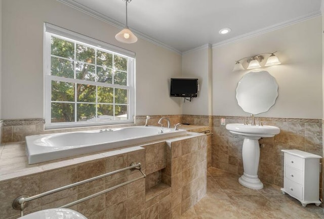 14 Winfield Way, Mary Esther, FL 32569 - bathroom featuring a bath, ornamental molding, tile patterned floors, tile walls, and a wainscoted wall