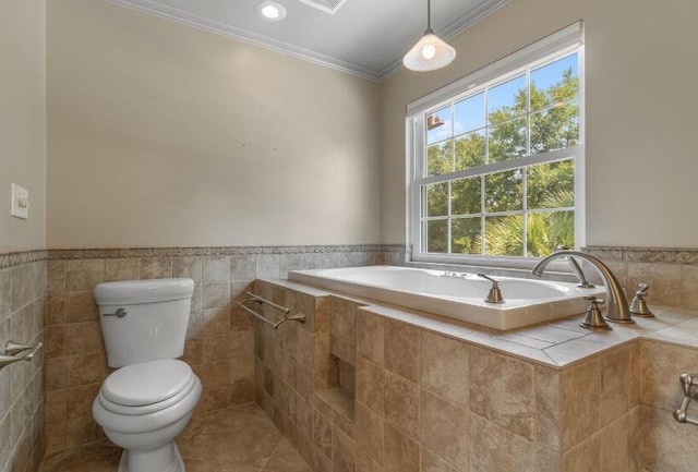 14 Winfield Way, Mary Esther, FL 32569 - bathroom featuring a bath, toilet, tile patterned flooring, a wainscoted wall, and crown molding