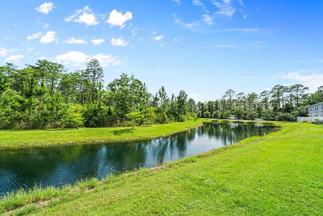 64 Crossing Ln Unit E, Santa Rosa Beach, FL 32459 - water view featuring a heavily wooded area