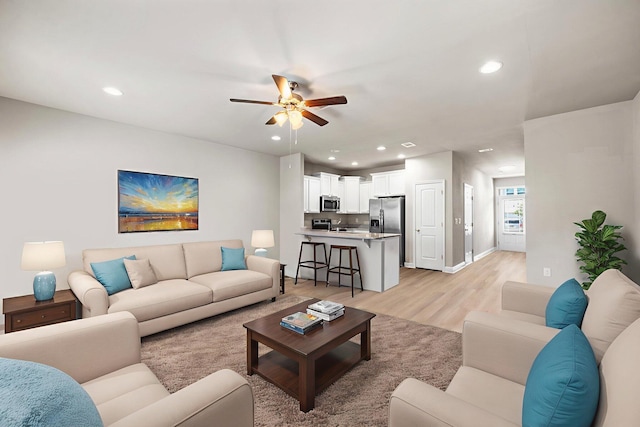 64 Crossing Ln Unit E, Santa Rosa Beach, FL 32459 - living room with recessed lighting, light wood-type flooring, ceiling fan, and baseboards