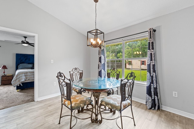 5123 Whitehurst Ln, Crestview, FL 32536 - dining space featuring light wood-style flooring, a chandelier, lofted ceiling, and ceiling fan
